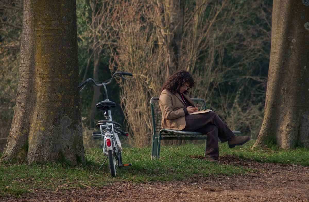 Adult practicing mindfulness meditation in natural light